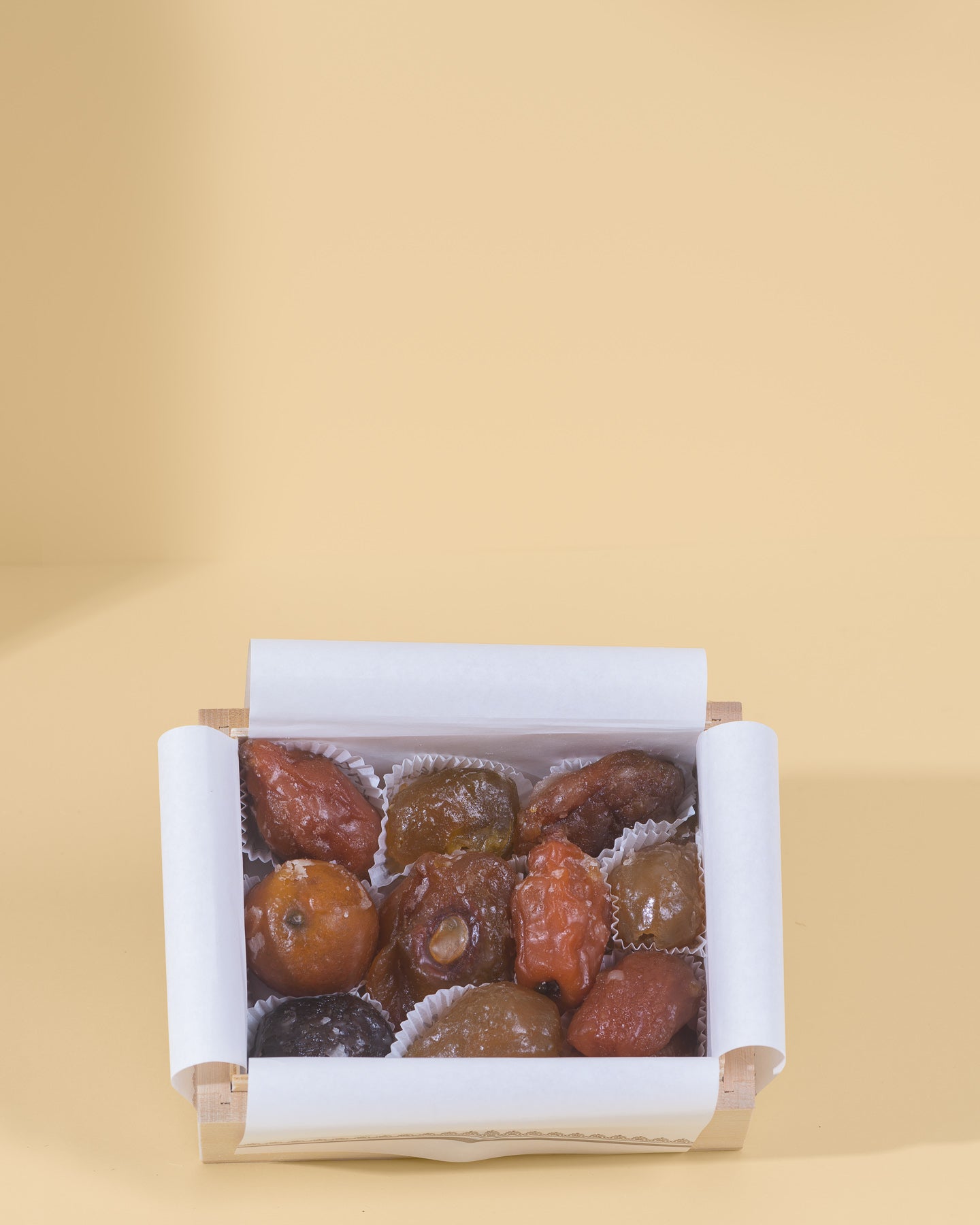 Wooden box of iced candied fruit
